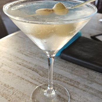 Bon Appetit - Dirty Martini on a busy night in the round-a-boot bar. - New American Near Me - Dunedin, Florida Bon Appetit - Dirty Martini on a busy night in the round-a-boot bar. - New American Near Me - Dunedin, Florida