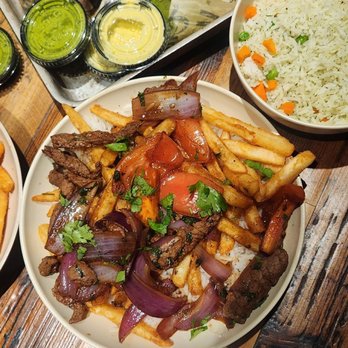 Viva Chicken - Chicken, steak Saltado and cilantro rice - Peruvian Near Me - Winston Salem, North Carolina Viva Chicken - Chicken, steak Saltado and cilantro rice - Peruvian Near Me - Winston Salem, North Carolina