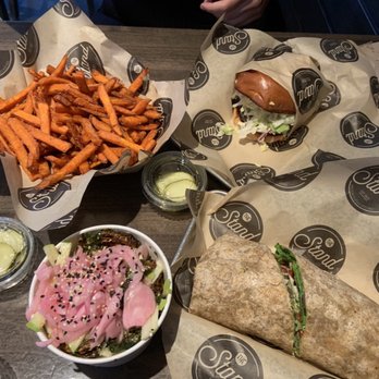 The Stand - American Classics Redefined - Sweet Potato Fries, Brussels Sprouts, falafel wrap, the Stand Burger - New American Near Me - Irvine, California The Stand - American Classics Redefined - Sweet Potato Fries, Brussels Sprouts, falafel wrap, the Stand Burger - New American Near Me - Irvine, California