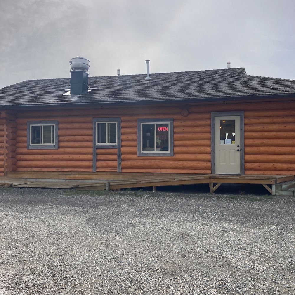 Rusty Iron Coffee Co - the front of a log cabin - Coffee Roasteries Near Me - 108 Mile Ranch, British Columbia Rusty Iron Coffee Co - the front of a log cabin - Coffee Roasteries Near Me - 108 Mile Ranch, British Columbia