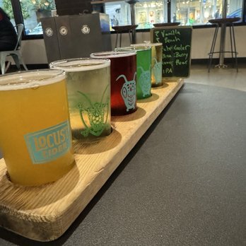 Locust Cider Market Place - Cider flight! Vanilla peach, Ecto, blackberry . Honey pear, double IPA, starting from the farthest down. - Cideries Near Me - Seattle, Washington
