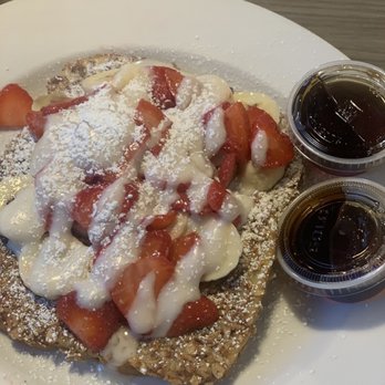 Pacific Southern - Almond toasted French toast with banana and strawberry slices with a light layer sweet frosting  and sprinkled with powdered sugar - Southern Near Me - Tacoma, Washington