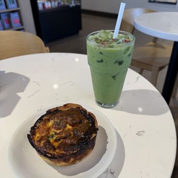 Lavender Coffee Boutique - Iced lavender matcha latte with almond milk and tomato & spinach quiche - Coffee & Tea Near Me - Englewood, Colorado Lavender Coffee Boutique - Iced lavender matcha latte with almond milk and tomato & spinach quiche - Coffee & Tea Near Me - Englewood, Colorado