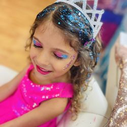 Dazzling Divas - 6 year old girl with a tiara wearing makeup and glitter