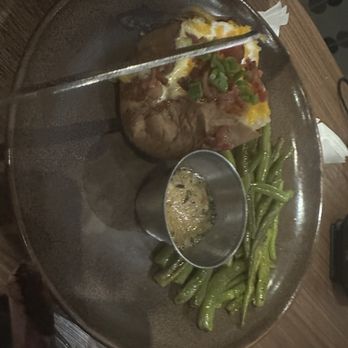 Black Angus Steakhouse - Loaded baked potato and green beans - Steakhouses Near Me - Lancaster, California