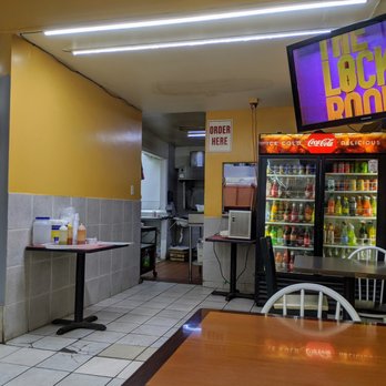 Mercado Acapulco - The taqueria is located in the back of the market. This is literally its interior storefront. - Mexican Near Me - Atlanta, Georgia