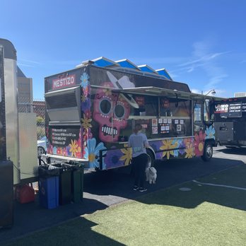 Mestizo - a food truck parked in a parking lot - Food Trucks Near Me