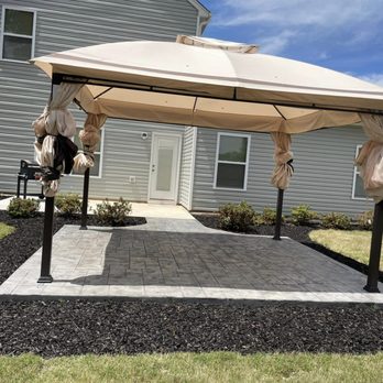 AA Landscape Design & Contractor - a patio with an umbrella - Masonry/Concrete Near Me AA Landscape Design & Contractor - a patio with an umbrella - Masonry/Concrete Near Me