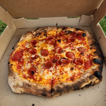 Traveling Tomato - Pepperoni pie - Food Trucks Near Me