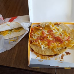 Mexican pizza were folded inwards like a taco and the soft shell taco was folded on the outside of the wrapping, was stone cold Mexican pizza were folded inwards like a taco and the soft shell taco was folded on the outside of the wrapping, was stone cold