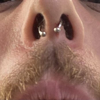 Sinners Tattoo Studio - Crooked septum piercing. - Tattoo Near Me - Dallas, Texas Sinners Tattoo Studio - Crooked septum piercing. - Tattoo Near Me - Dallas, Texas