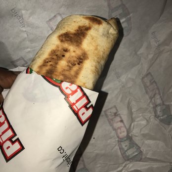 Pita Pit - a hand holding a burrito - Sandwiches Near Me - Collingwood, Ontario Pita Pit - a hand holding a burrito - Sandwiches Near Me - Collingwood, Ontario