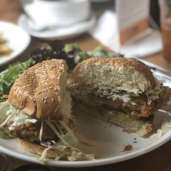 Poached Kitchen - Chicken Sandwich w/fried adobo marinated Mary's Free Range organic chicken, serrano slaw, pickles, mayo, sesame brioche, simple side salad. - Breakfast & Brunch Near Me - Irvine, California