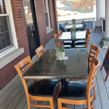 Shooter's Taproom & Kitchen - a table and chairs on a porch - Salad Near Me - Chillicothe, Missouri Shooter's Taproom & Kitchen - a table and chairs on a porch - Salad Near Me - Chillicothe, Missouri
