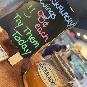 Duck Deli - a sign and a cup of tea - Delis Near Me - Duck, North Carolina Duck Deli - a sign and a cup of tea - Delis Near Me - Duck, North Carolina