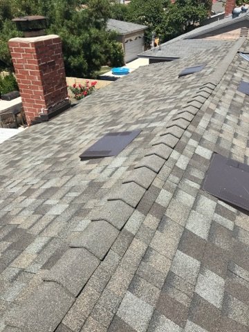 Slide of MTZ Roofing & Gutters