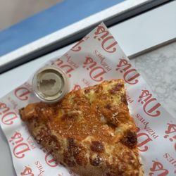 Di’s Pizza Pies - Vodka sauce pizza slice with a side of gravy dip!
