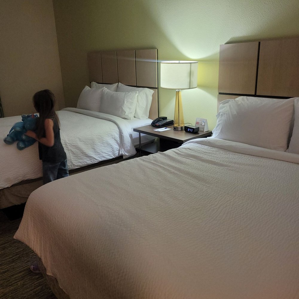 Candlewood Suites - 2 queen size beds they said .NOPE these  ate bigger then that ! And soooo comfortable!! - Hotels Near Me - Lodi, California