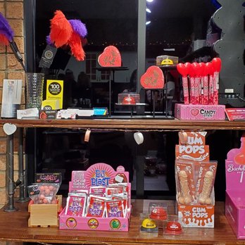 Groove - Display with candles & feathers - Adult Shops Near Me - Gilbert, Arizona Groove - Display with candles & feathers - Adult Shops Near Me - Gilbert, Arizona