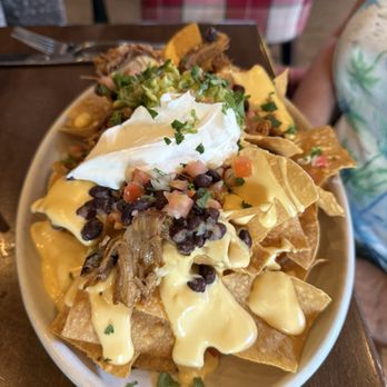Culinary Dropout - This is the BBQ Pork Belly Nachos, and it's definitely portioned for two! - New American Near Me - Tempe, Arizona