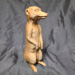 Make Mine 3D - 3D Printed Meercat made of a plastic filament with real wood mixed in giving the appearance of real wood.
