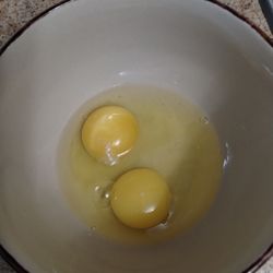 And these are the eggs I get??! I have never in my life seen eggs that look like this. The yolks are almost as white as the whites!! WTF???