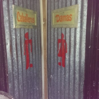 Palmas Restaurant - Bathroom doors - Puerto Rican Near Me - San Juan, Puerto Rico Palmas Restaurant - Bathroom doors - Puerto Rican Near Me - San Juan, Puerto Rico
