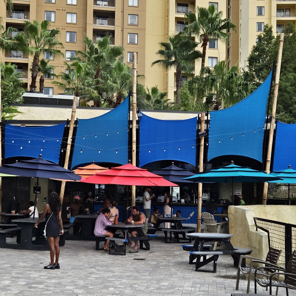 Escudo's Bar & Grill - Outside by the pool area - Cocktail Bars Near Me - Orlando, Florida Escudo's Bar & Grill - Outside by the pool area - Cocktail Bars Near Me - Orlando, Florida