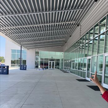 Boeing Center at Tech Port - a man pointing to the side of the building - LAN Centers Near Me - San Antonio, Texas Boeing Center at Tech Port - a man pointing to the side of the building - LAN Centers Near Me - San Antonio, Texas