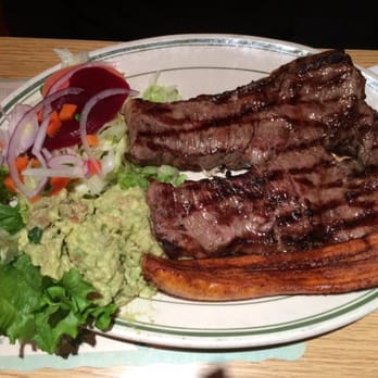 Pollos Mario - #25 sirloin steak with sweet plantain and guacamole. Also comes with rice and beans. - Steakhouses Near Me - Woodside, New York Pollos Mario - #25 sirloin steak with sweet plantain and guacamole. Also comes with rice and beans. - Steakhouses Near Me - Woodside, New York