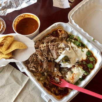 Paseo - Caribbean Bowl w/ pork to-go and chips & salsa. - Caribbean Near Me - Seattle, Washington Paseo - Caribbean Bowl w/ pork to-go and chips & salsa. - Caribbean Near Me - Seattle, Washington
