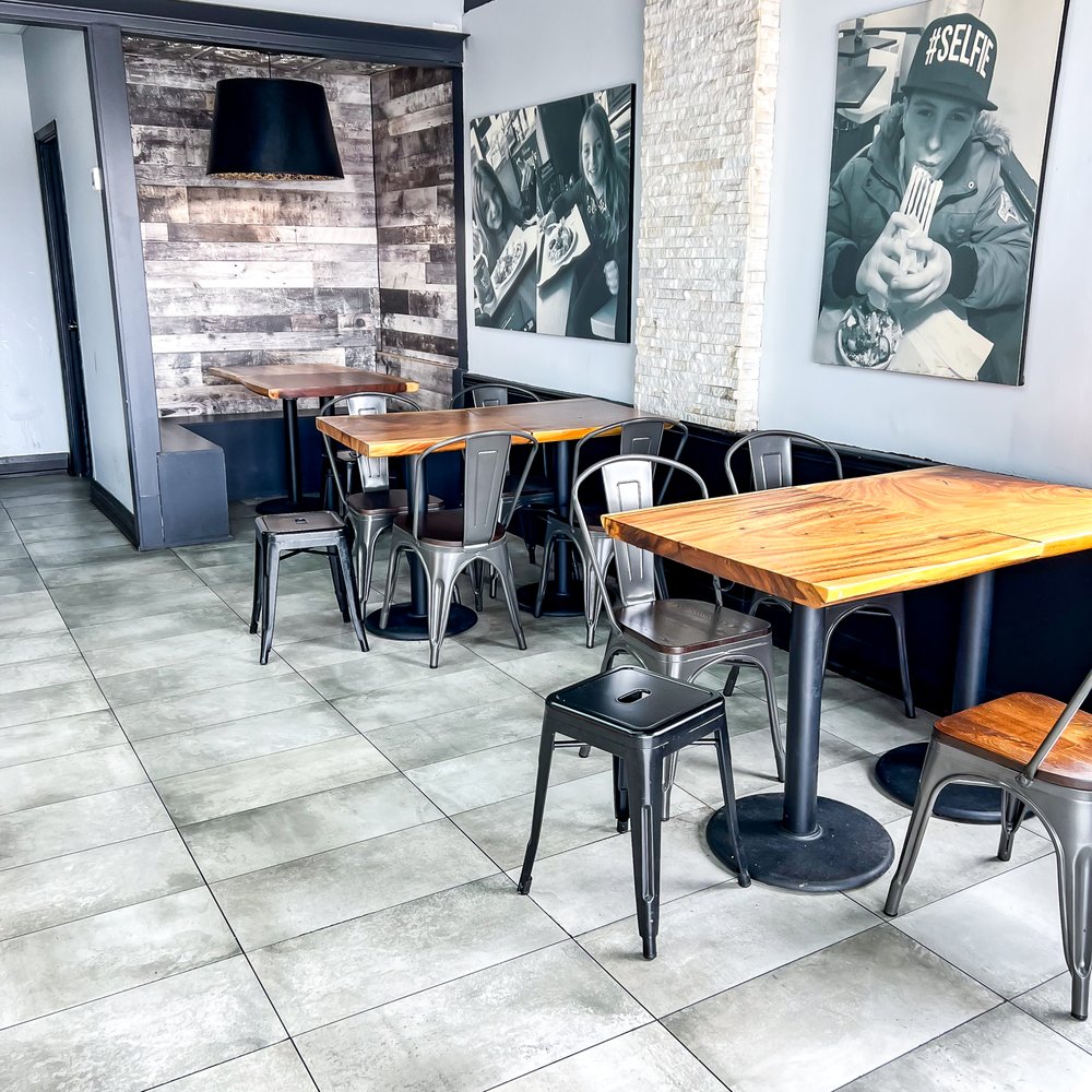 Johnny's Shawarma - tables and chairs in a restaurant - Middle Eastern Near Me - Toronto, Ontario Johnny's Shawarma - tables and chairs in a restaurant - Middle Eastern Near Me - Toronto, Ontario