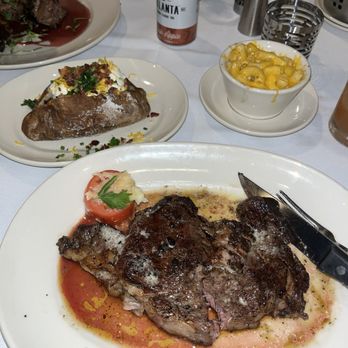 Parker's On Ponce - Ribeye* Loaded Baked Potato Macaroni and cheese Herb Rubbed Rack of Lamb* - Steakhouses Near Me - Decatur, Georgia Parker's On Ponce - Ribeye* Loaded Baked Potato Macaroni and cheese Herb Rubbed Rack of Lamb* - Steakhouses Near Me - Decatur, Georgia