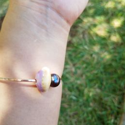 Custom rose gold bangle with puple shell and peacock pearl