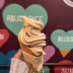 Strawberry and salted caramel on a waffle cone Strawberry and salted caramel on a waffle cone