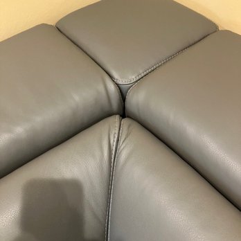 Ashley Store - Top where wedge meets corners. It's all different heights and pulled at the top - Furniture Stores Near Me - Orion, Michigan