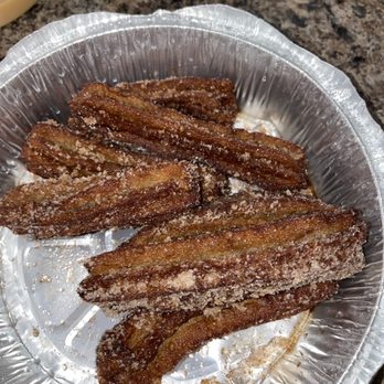 La Una Cantina - Nasty, burnt, and very greasy....GROSS! They're literally pre frozen churros, how did you manage to mess that up ! - Mexican Near Me - Bloomington, Indiana