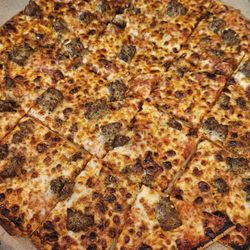 Domino's Pizza - Large thin crust 1-topping, Italian sausage pizza