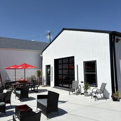 The Garage On Water - Patio is awaiting you