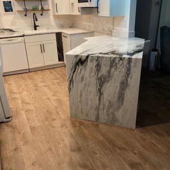 Keystone Granite - Picture is of the waterfall from peninsula. Notice how well the grain matches - Countertop Installation Near Me - Salem, Oregon