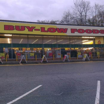 Buy-Low Foods - a storefront with a sign in front of it - Grocery Near Me - Burnaby, British Columbia Buy-Low Foods - a storefront with a sign in front of it - Grocery Near Me - Burnaby, British Columbia