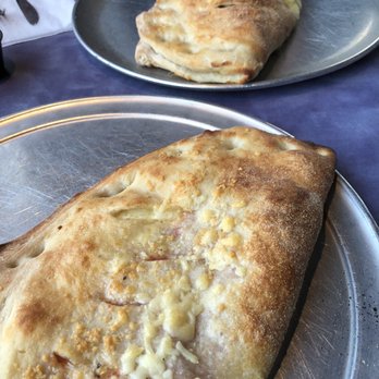 Tomato Jake's - Cheese calzone and meat lovers calzone - Pizza Near Me - Durham, North Carolina Tomato Jake's - Cheese calzone and meat lovers calzone - Pizza Near Me - Durham, North Carolina