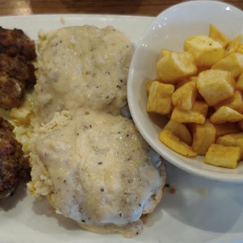 Another Broken Egg Cafe - Biscuits and gravy. - American Near Me - Orlando, Florida Another Broken Egg Cafe - Biscuits and gravy. - American Near Me - Orlando, Florida