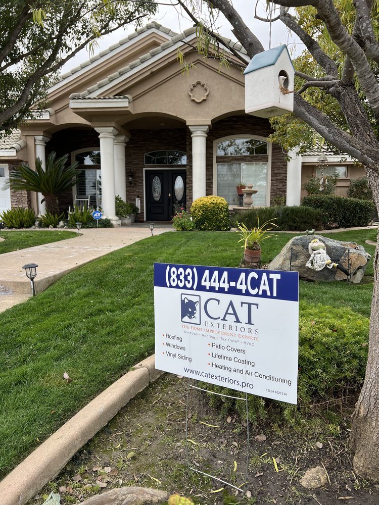 Slide of CAT Exteriors