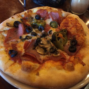 NYPD Pizza - Personal pizza with pepperoni, ham, mushroom, olives, and 1/2 jalapeños, well done pizza - Pizza Near Me - Gilbert, Arizona