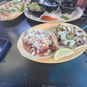 Taco Lucha - i order one Slayer on the (right) it was really really spicy, to the left its carnitas taco not a big fan of the pineapple but i took it off - Mexican Near Me - Manhattan, Kansas