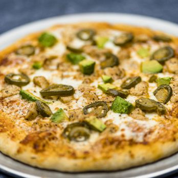 Benders Sports & Spirits - a pizza on a plate - Sports Bars Near Me - Richardson, Texas Benders Sports & Spirits - a pizza on a plate - Sports Bars Near Me - Richardson, Texas