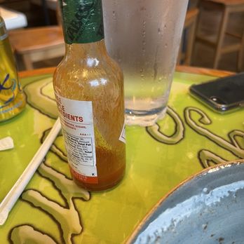 Margaritaville - Atlanta - She gave us an empty bottle of hot sauce lol - Tiki Bars Near Me - Atlanta, Georgia