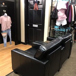 Seating for comfort while waiting for your shopping partner to try on clothes.