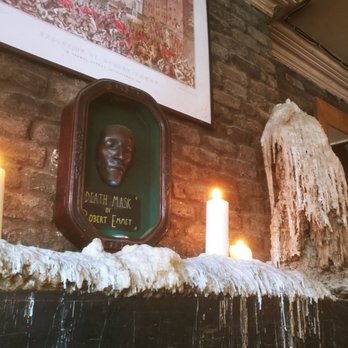 Arthur's Pub - Wall decor . Death mask of someone hung outside the pub many many many many many years ago. Eerie but cool . - Bars Near Me - Dublin, D
